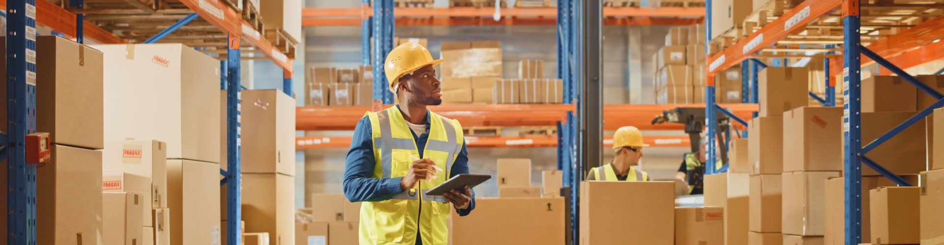 man checking warehouse