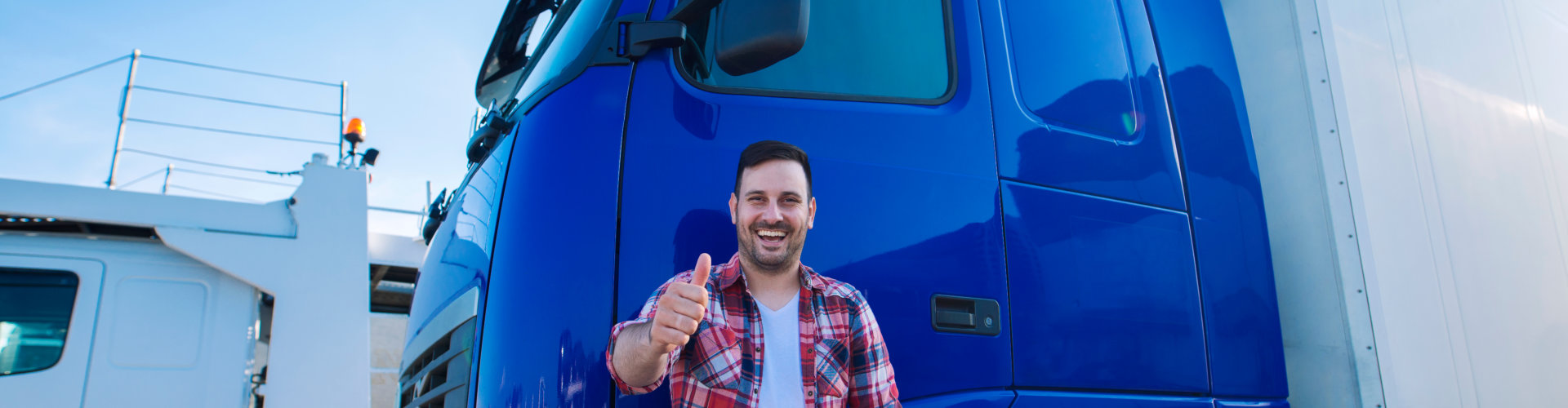 truck driver giving thumbs up